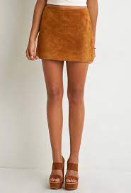 Go casual with a loose sweater, like our open back sweater, or more dressy with a blouse, like our bodysuit blouse. Forever 21 Genuine Suede Mini Skirt In Brown Lyst