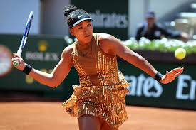 Naomi Osaka has fun with fashion at the French Open. She'll have to win again to show off her next look
