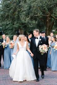Black And Blue Wedding Party A Classically Beautiful Wedding Features Bridesmaids In Blue Gowns Groomsmen In Black Tie Black Tie Wedding Bridesmaids Black Wedding Themes Pale Blue Wedding