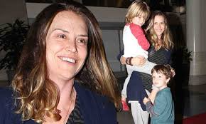 Brooke Mueller and excited sons Bob and Max, five, jet out of LAX