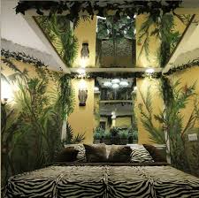With the right bedding and decor anyone can create a beautiful and exotic jungle let us first start with the bed which will be the main focal point. Inn Of The Dove Jungle Room 2 Home Decor Design Jungle Themed Bedroom Jungle Bedroom Theme Bedroom Themes
