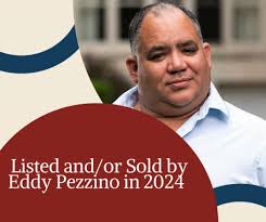 Applauding Eddy Pezzino, Lic. RE...