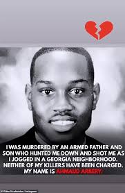 Family of black jogger, 25, shot and killed by two white men demand justice 