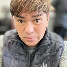 this was so cheap to do! (Halloween DIY) use your leftover amazon boxes to  create an awesome boarded-up haunted house look for your front door! this  was such a budget friendly decoration.