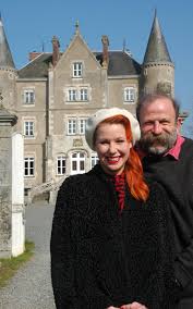 Angel teaches a woman how to gild a metal wall drape holder with bronze leaf to give a touch of luxury to a bedroom, and the woman will apply her new skill to gild the exterior of a cast iron bathtub back at her chateau, 400 miles away, that she and her husband have owned since 2004. Escape To The Chateau Perfectly Cast Fantasy Television Full Of Innocent Charm Review Angel Strawbridge Angel Adoree Chateau Style