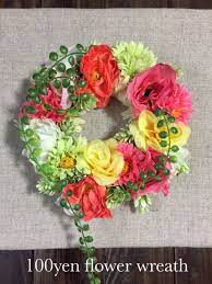 セリアのファブリックボードにダイソーの造花でリースを ファブリックボード 造花 しめ縄 リース
