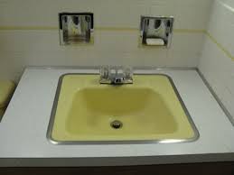50s yellow bathroom sink retro