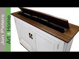 You may create a long wooden television stand and divide the space into several storage. How To Build A Tv Lift Cabinet Making The Top Tv Lift Cabinet Pop Up Tv Cabinet Hidden Tv