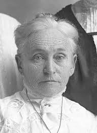 Scene in a desert of a woman and her daughter with villagers? Date and  place unknown. The car appears to be a Ford T (someone correct me). Taken  from a stereoscopic negative.