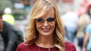 Amanda Holden's brown leather dress has her Instagram fans rushing to John  Lewis