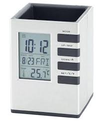 Business people working on an office desk. Tuelip Digital Clock Office Corporate Pen Holder Cube Desk Pen Stand Buy Tuelip Digital Clock Office Corporate Pen Holder Cube Desk Pen Stand At Best Price In India On Snapdeal