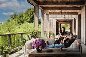 Mila kunis' bra and breast size. Step Inside Ashton Kutcher And Mila Kunis S Sustainable L A Farmhouse Architectural Digest