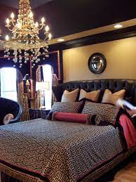 The bright white walls and simple black accents lend an unfussy and uncluttered feel, and a peaceful vibe is guaranteed. Dramatic Black And Gold Master Bedroom Home Home Bedroom Home Decor