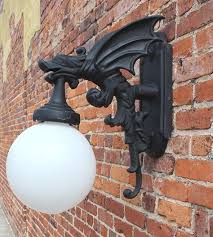 Dragon wall lamp in york minster, york, england pam's britain dragon wall lamp pt220 $19200 : 13 Dragon Wall Sconce Ideas Electric Wall Sconce Sconces Dragon Wall