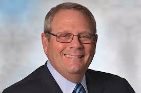 Kellogg adds former Kroger CFO to board