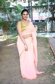 A clothing cutout in the front of a garment that exposes the navel. Indhuja Ravichandran In Saree Photos At Super Duper Movie Trailer Launch Ritzystar