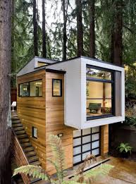 Browse inspirational photos of modern exteriors from houses to cabins, apartments to shipping containers. The Elevated Picture Window With Garage Under In 2020 Tiny House Exterior Modern Tiny House Modern House Design