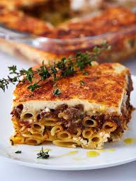 A Traditional Greek Lasagna Pastitsio Recipe Layers Of Ziti Pasta Beef Sauce Bechamel Sauce Sprinkled With Feta Pastitsio Greek Lasagna Pasticio Recipe