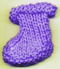 We knit baby booties with knitting needles for a newborn. 29 Free Patterns For Knitted Baby Booties Guide Patterns