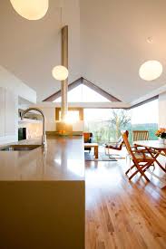 kitchen island, dining space, lighting