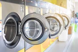 Some people scour auctions for that one coin that's missing from their collections. Premium Photo Maid Placing Pink Towel In Small Washing Machine Next To Shower Stall In White Tiled Bathroom