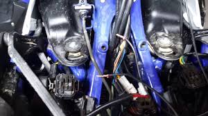 This large hole is accessed via a 17mm hex drain plug. How To Install A Tethered Kill Switch On A 2015 Yamaha Yfz 450r Youtube