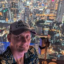 THIS IS A SCAM. It's called a pig butchering scam. They will text you,  usually with a wrong name, and try to get you to reply. This "wine bottle"  one is pretty