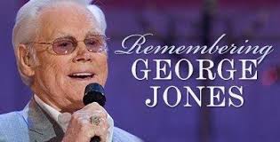 George Jones with Tommy Tomlinson not sure of the guys name playin fiddle!