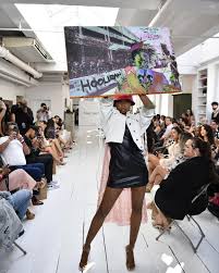 The EnVogue Fashion Collective Debut runway show opened with one-of-a-kind  statement pieces by artist Dani Ropi🔥⁣ ⁣ Catching the crowd's attention  right away with statements like “Don't Tell Me What To Do”, “