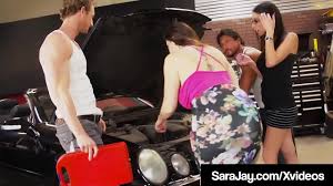 Fuck Fiend Sara Jay & dark haired hottie, DavaFoxx, fix their broken down  vehicle by sucking & banging two big hard dick auto mechanics until they  get their cum! Full Video &