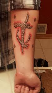 Within the series, doomguy is a space marine dressed in green combat. My Mark Of The Doomslayer Tattoo Wip Just Need To Get The Inside Done In Red So It Feels More Like Red Cracked Stone Tell Tattoos Doom Game Thinking Of You