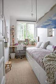 First of all, i think it would help to divide this room even more, into two different areas, visually, by adding another rug to the space. Room Decor Long Narrow Bedroom Ideas Small Apartment Bedrooms Cozy Small Bedrooms