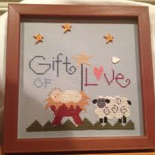 • looking for an advice video on how to design cross stitch patterns? Gift Of Love Cross Stitch Lizzie Kate Design Baby Jesus In Manger With Lamb Christmas Cross Stitch Cross Stitching Cross Stitch