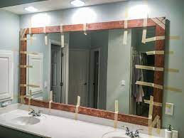 These hometalkers have transformed basic mirrors of various shapes and sizes into classy bathroom centerpieces that demand to be looked into. How To Diy Upgrade Your Bathroom Mirror With A Stained Wood Frame Building Our Rez