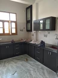 The black kitchen top compliments the material of the cabinets, and the shades in the room. Aapke Ghar Ki Raunak Karigar Wooden Furniture Contractor Facebook