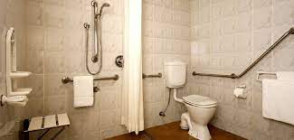 These design requirements must be met for most public and commercial bathrooms. Bathrooms For The Disabled Necessary Handicap Design Elements For The Home Bathroom Accessible Homes Advisor