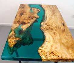 The intricate knots, cracks, deformities and patterns of the burled wood, combined with trapezoid steel legs give it a spectacular look. How Much Epoxy Resin Do I Need For A River Table Thewoodweb