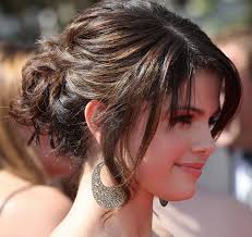 You should consider your face shape and complexion before knotting a bun. Messy Buns For Long Hair Novocom Top