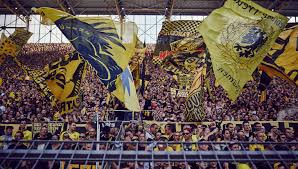 Stepping out of dortmund's airport and onto the city bus we were greeted with a massive banner wir sind during conversations i suggested the yellow wall was superior to the modern kop in terms of. The Yellow Wall Borussia Dortmund Soccerbible