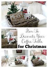 The centerpiece garland draped down the table acts as a runner. How To Decorate Your Coffee Table For Christmas Christmas Coffee Table Decor Coffee Table Centerpieces Holiday Coffee Table Decor