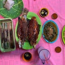 With a nice view and ocean breeze of the straits of malacca your visit to this historical city will never complete without a taste of umbai's signiture cuisine 'ikan bakar'.just 12km from malacca town follow a old route to muar after telok mas you will see a signboard. Photos At Umbai Grill Fish Melaka Melaka