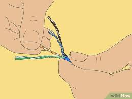 Carefully push all 8 unstripped colored wires into the connector. How To Create An Ethernet Cable 11 Steps With Pictures