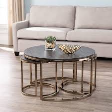 Find a coffee table that echoes the rich tones and elegant style of your current decor, and pair it with a few matching end tables to create a cohesive look. Lokyle Round Nesting Coffee Tables 3pc Set Glam Champagne By Ember Interiors Walmart Com In 2021 Nesting Coffee Tables Round Nesting Coffee Tables Living Room Table Sets