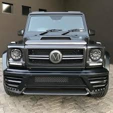Mansory Is Offering A Variety Of Parts For The Mercedes Benz G63 Amg Pictured Here Is The Carbon Fiber Front Bumper With Integra Merc Benz Benz Mercedes Benz