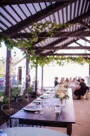 Oak Farm Vineyards Wedding Classy Farm Tables For The Bridal Party Under The Lovely Grape Arbor Next Farm Table Vintage Wedding Rentals Rustic Vintage Wedding