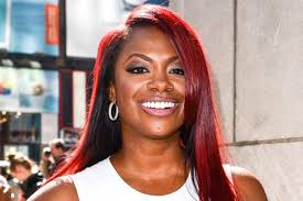 Between her play A Mother&#39;s Love and her stint acting in the Off-Broadway production Newsical, Kandi Burruss&#39; career is red-hot at the moment. - dish-110813-kandi-burruss_0_2