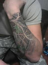 Black And White Camouflage Tattoo Camo Tattoo Designs And Ideas Camo Themed Tattoos Camo Tattoo Tattoos For Guys Tattoos