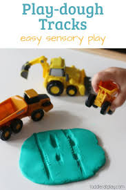 Play Dough Truck Tracks Activity Toddler At Play Playdough Activities Playdough Sensory Play