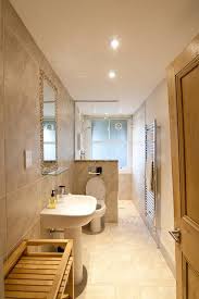 Some of the best small bathroom ideas are all about creating space for storage, including your soaps and bottles. 19 Narrow Bathroom Designs That Everyone Need To See Long Narrow Bathroom Small Narrow Bathroom Narrow Bathroom