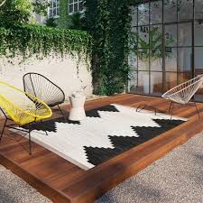 Place a small outdoor rug by the door to keep dirt from tracking inside, or opt for a large outdoor rug to pull together a seating or dining area on your patio. Mod Desert Outdoor Rug Project 62 Target Neutral Rugs Outdoor Area Rugs Indoor Outdoor Rugs